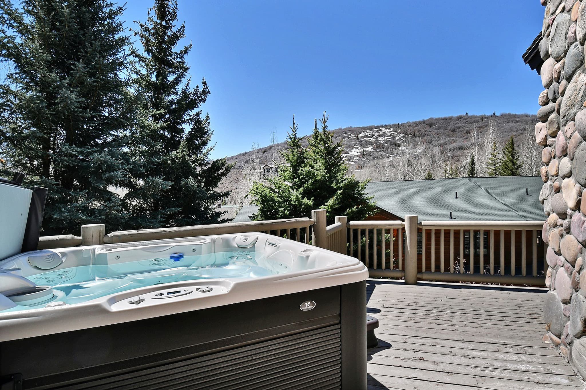 New Deck Featuring a Private Hot Tub With Mountain Views.